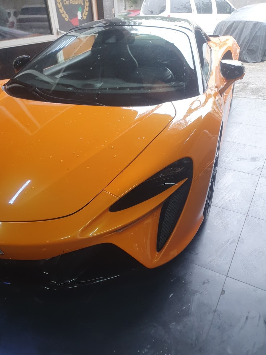 An orange sports car after polishing